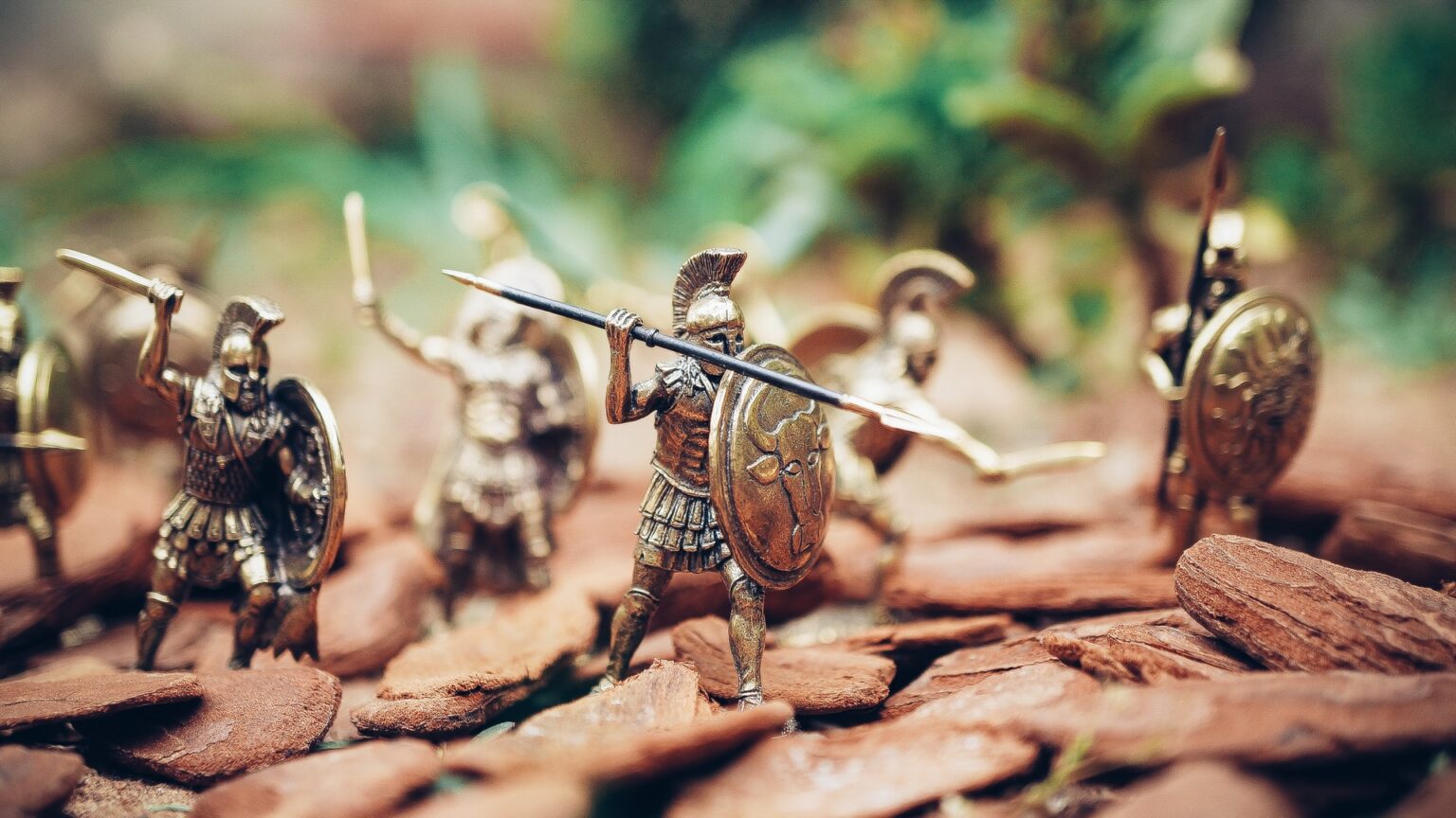 Toy soldiers with shields and spears to symbolize event security