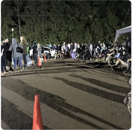 "A photo of attendees sleeping in the mud after Tomorrow World while waiting for their cabs. The event management fail here is lack of arrangements for emergency evacuation."