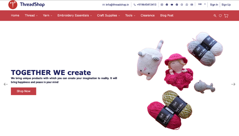 ThreadShop ecommerce website homepage showing red navigation bar with product categories (Thread, Yarn, Embroidery Essentials, Craft Supplies, Tools, Clearance) and featured embroidery hoop product with Shop Now CTA button