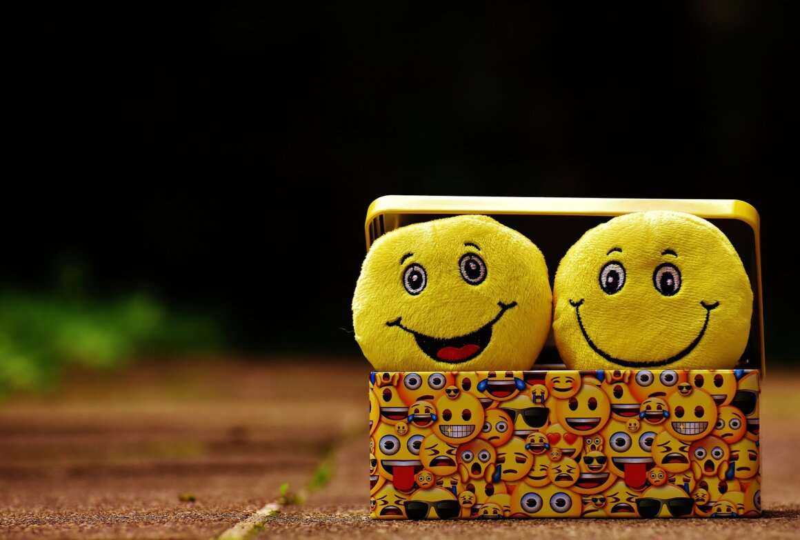 Stock photograph of two smiling plush toys