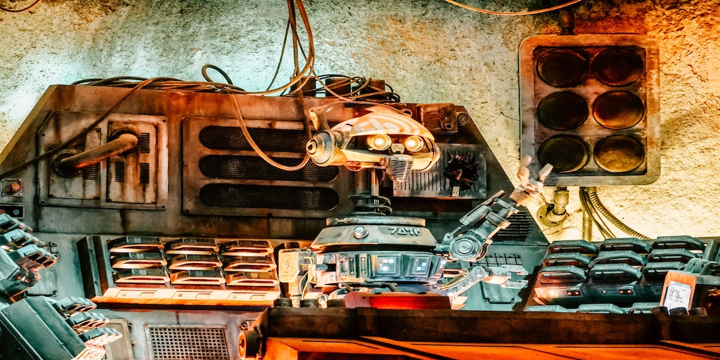 A rusty artificial intelligence robot in their workshop