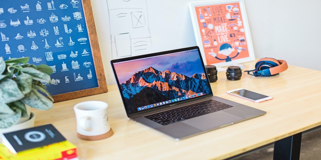 A working laptop on a desk