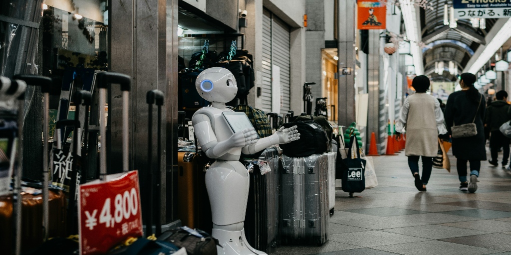 A robot infront of a shop