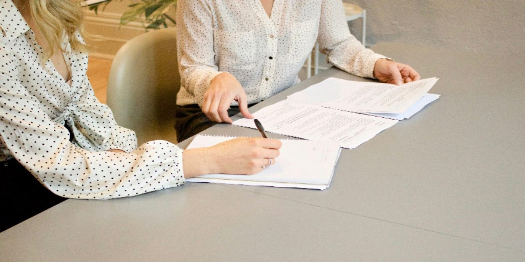 A person signing a document