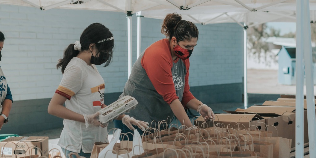 Employees working at a food donation drive