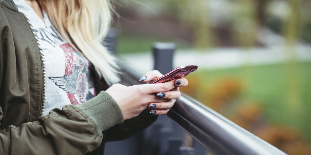 person looking into the mobile