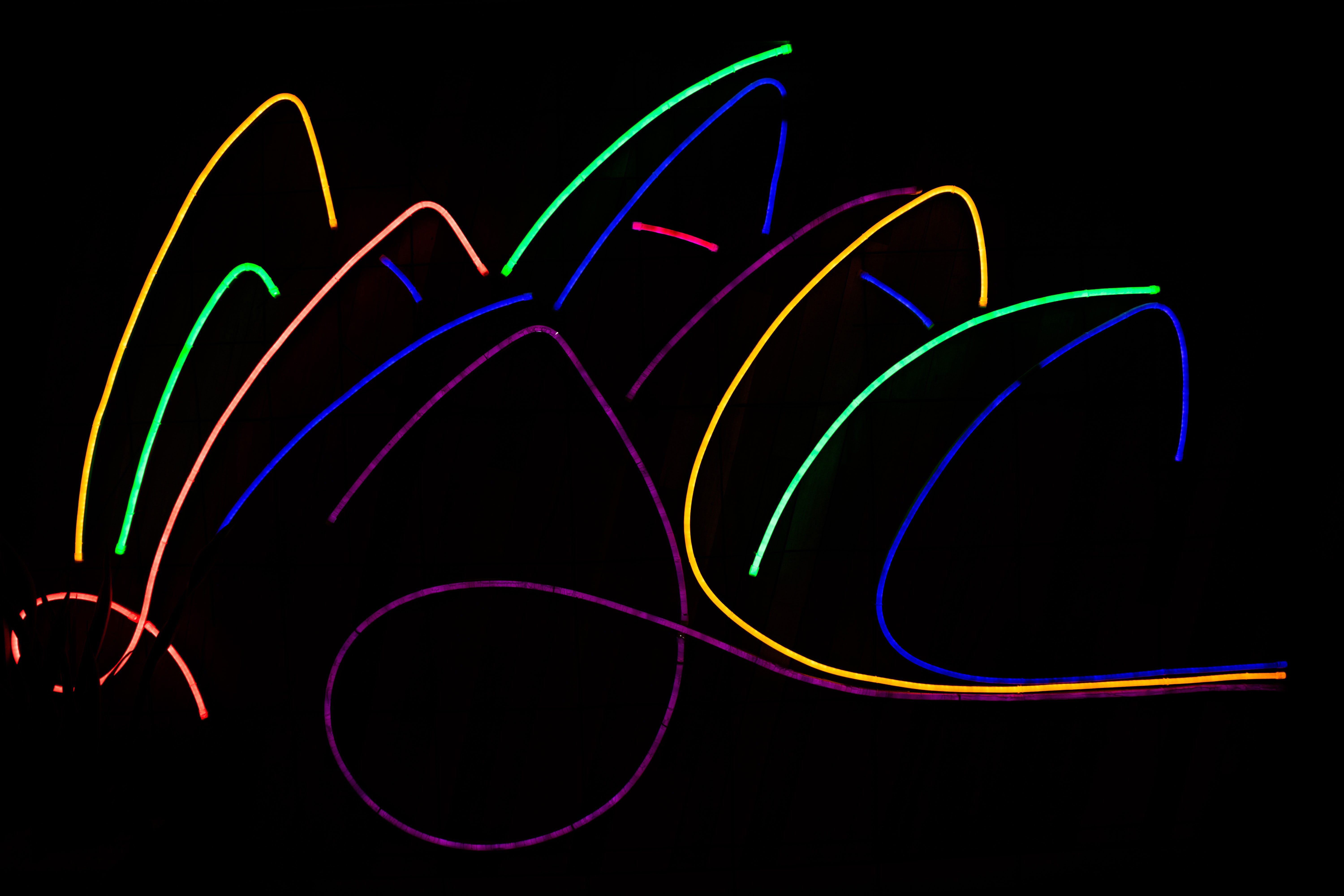 "Google colours oulining the shape of the Sydney Opera House, at a Google event"