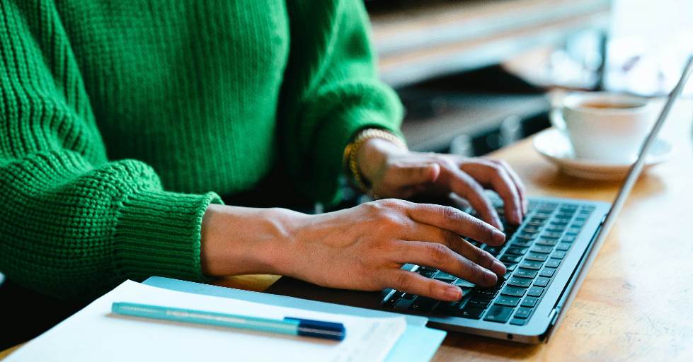 A woman working on a laptop